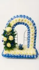 Gates of heaven with blue and white flowers funeral tribute for a loved one sidcup florist
