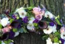 Sympathy wreath in white and purple dartford florist
