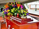 a colorful casket in a hearse or chapel before funeral or burial at cemetery