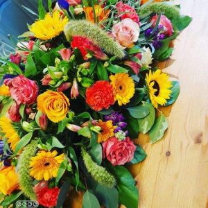 Bold and Beautiful Coffin Spray