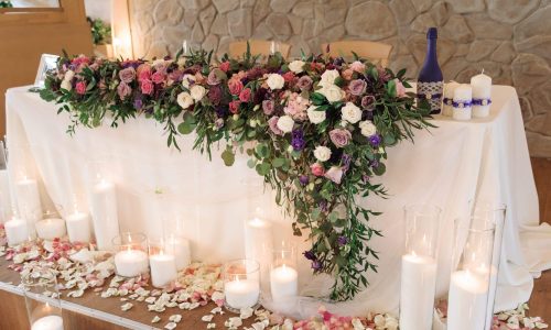 Wedding,Table,Decorated,With,Bouquet,And,Candles